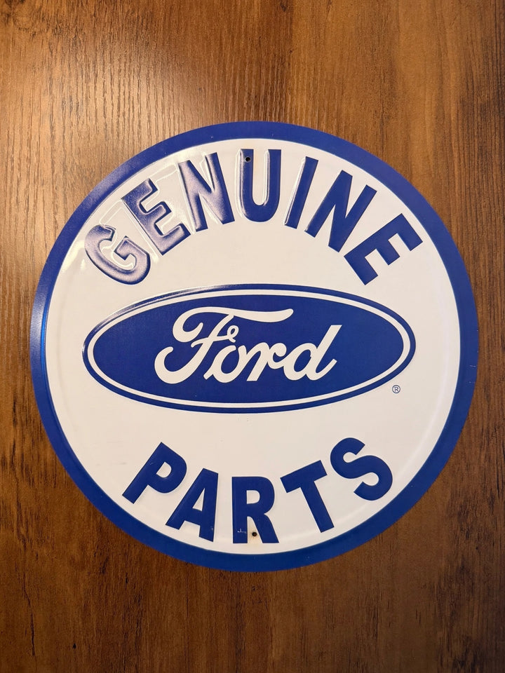 Ford Genuine Parts round embossed metal sign