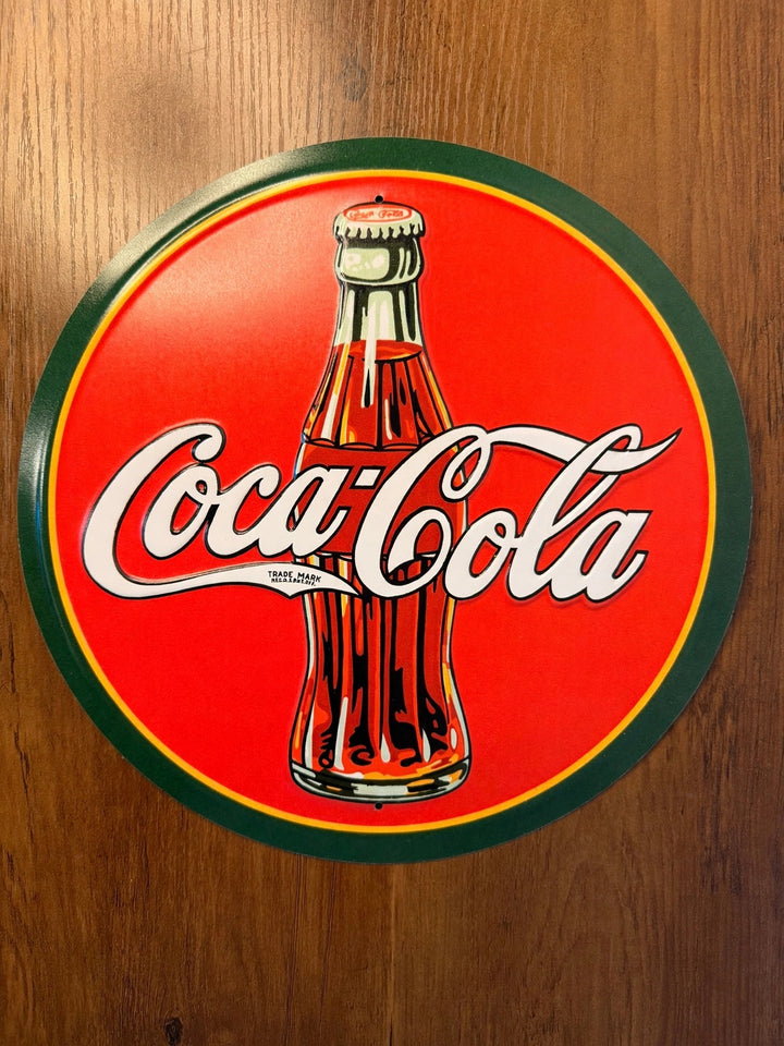 Coca-Cola round tin sign with 1930s bottle and script logo