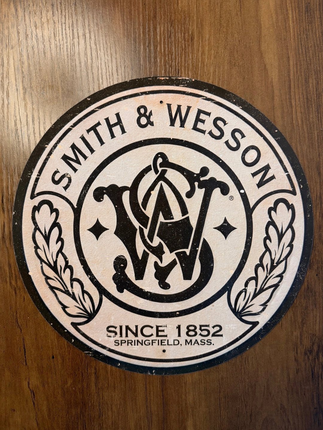 Smith and Wesson Since 1852 Springfield Mass round tin sign
