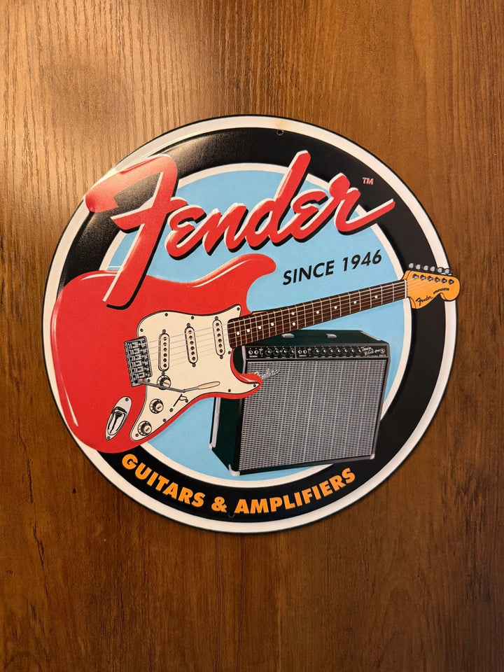 Fender Guitars and Amplifiers Since 1946 round tin sign with red guitar